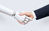 An image showing a robot extending its mechanical hand to shake hands with a human, illustrating the intersection of technology and humanity, as well as the collaboration between humans and AI in modern society.